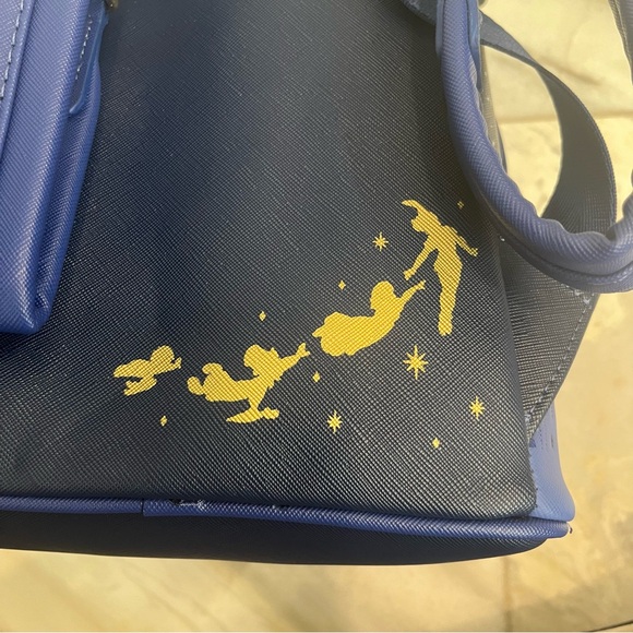 LOUNGEFLY NWT DISNEY PARKS MICKEY MAIN ATTRACTION PETER PAN’S FLIGHT BACKPACK - Picture 8 of 8